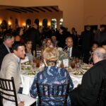 Guests having dinner at The 13th Annual Evening with the Bishops hosted by St. Dominic Village.