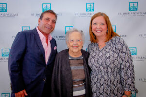 Amy Shields with Johnny Carraba and his mom | St. Dominic Village